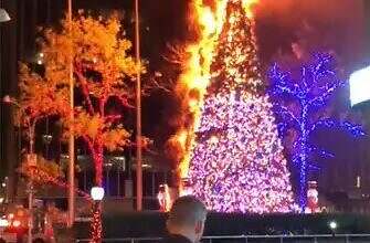 Hombre se sube a conocido árbol de Navidad en Midtown Manhattan y le prende fuego